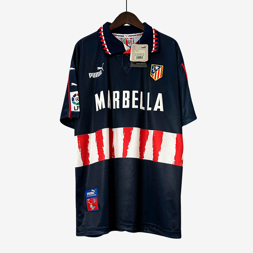 7-192_0d4defc5-c8f7-4c88-a4de-80bc99d936c3 Atletico Madrid 1997/98 Away Jersey – Retro Version - Image 1