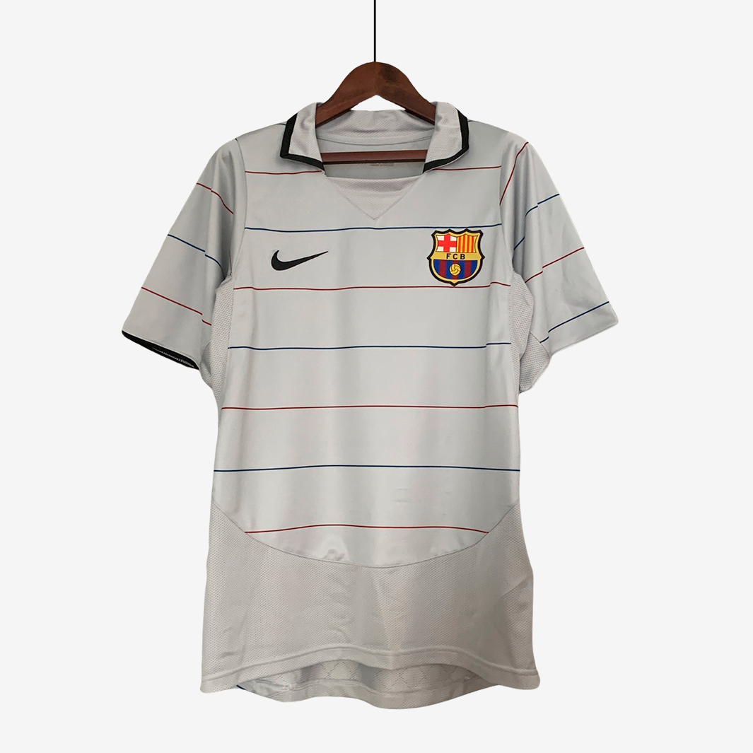 7-289_2f3118b8-0117-4125-893b-48bbd7e395b0 Barcelona 2003/04 Away Jersey – Retro Version - Image 1