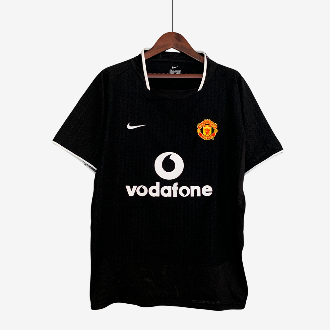 7-273_aeb38df1-c5eb-4191-9198-ebe76e784b53 Manchester United 2003/04 Away Jersey – Retro Version - Image 1