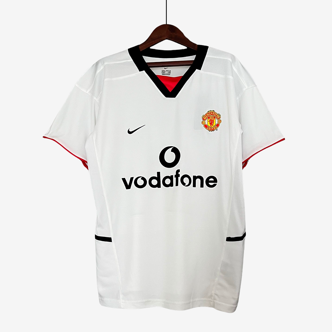 7-318_4f96d9c8-daab-4c39-83b1-09a579daec25 Manchester United 2002/03 Away Jersey – Retro Version - Image 1